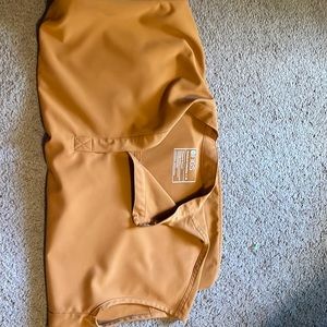 Figs burnt orange Rafaela scrub top. Never worn but took off the tags.